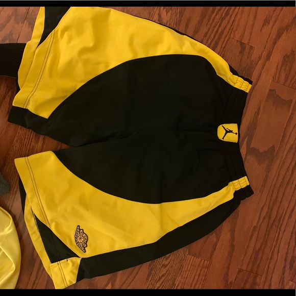 black and yellow jordan shorts